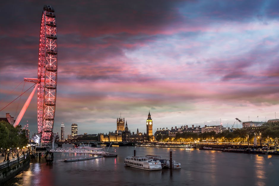 Dramatic sunset over London with the London Eye and River Thames view.